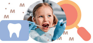 Pediatric dentist examining child’s teeth
